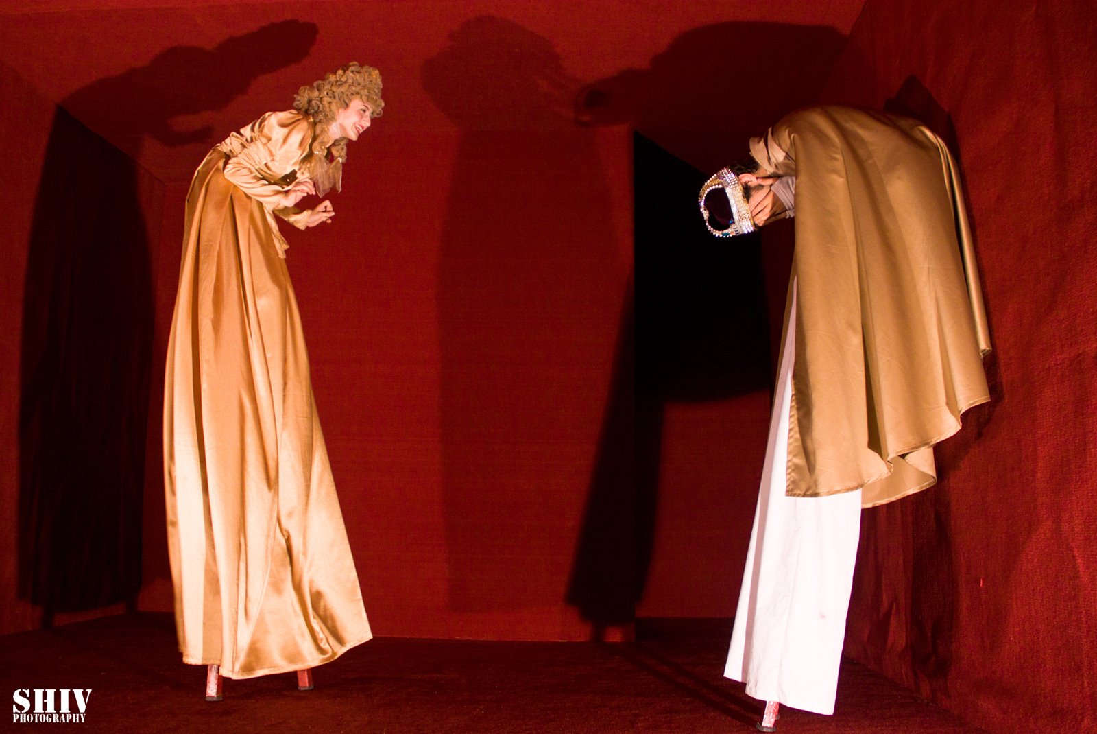 Performers in warm light on stage