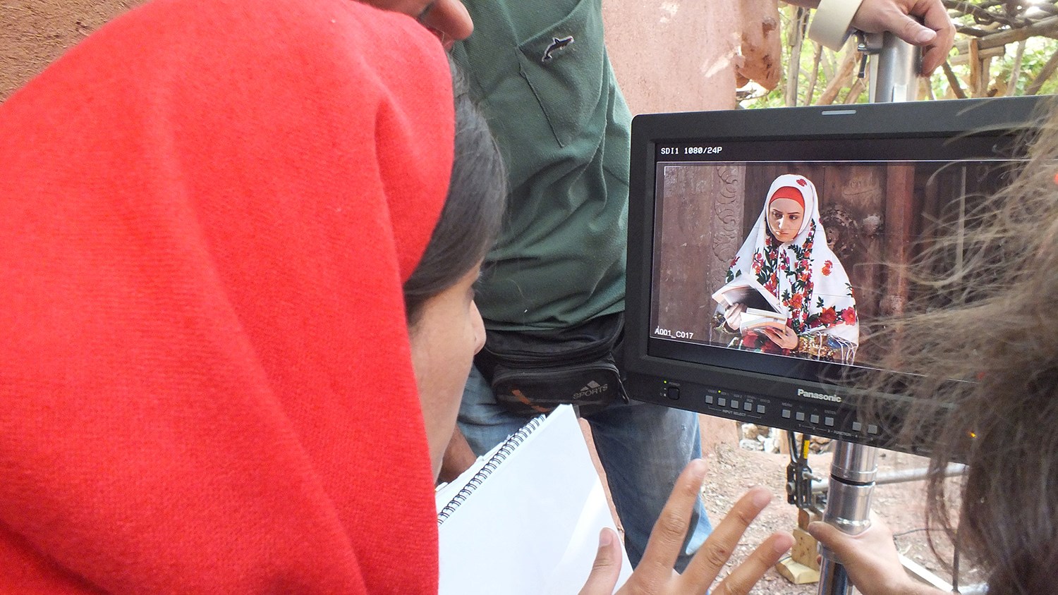 A film monitor showing a scene in production
